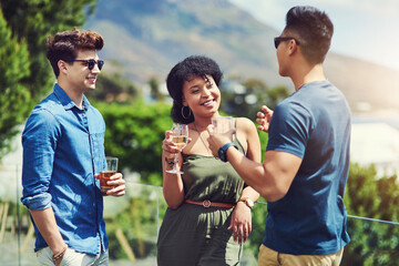 Wall Mural - People, friends and talking with drinks on rooftop for celebration, summer holiday and bonding in nature. Group, happy and reunion with alcohol, vacation and weekend trip on balcony with conversation