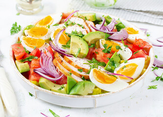 Wall Mural - Healthy cobb salad with chicken, avocado, tomato, red onions and eggs. American food.