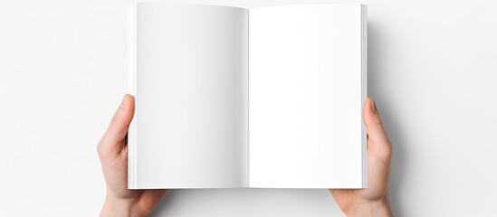 Aufkleber - A5 open book mockup held by hands showcasing a blank page for design isolated on a white background providing copy space image