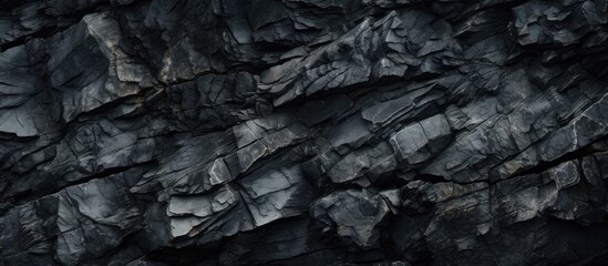 Poster - A background image featuring a textured black stone providing ample copy space