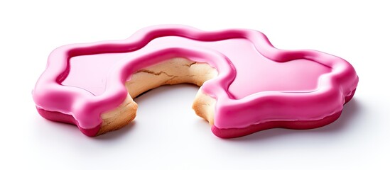 Aufkleber - A pink cookie cutter can be seen on a white background in this image that has copy space