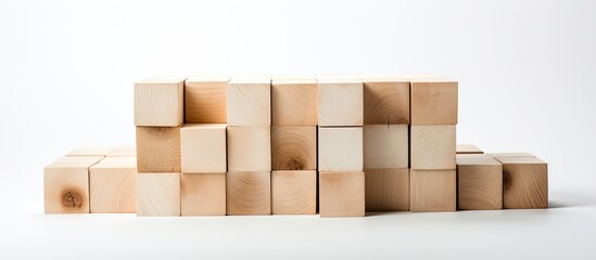 Aufkleber - A copy space image featuring square wooden blocks on a white background