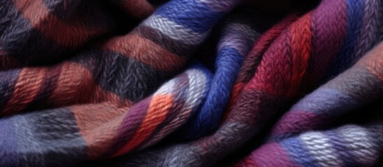 Poster - Close up of a soft and cozy woolen plaid scarf with a delicate texture showcasing its large weave pattern Copy space image
