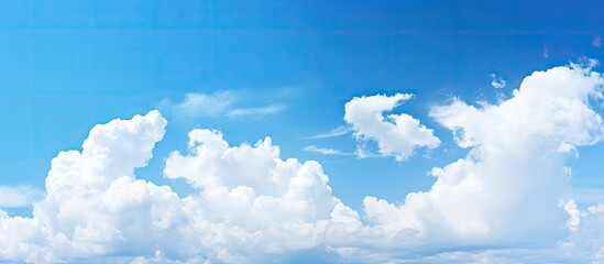 Aufkleber - Background with a clear blue sky and white clouds perfect for copy space image