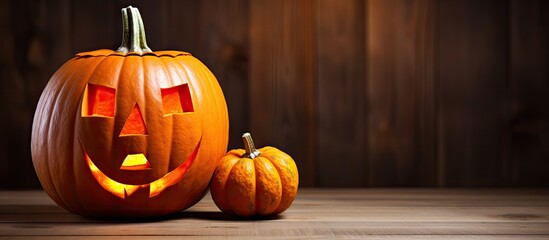 Aufkleber - A Halloween pumpkin head jack o lantern placed on a wooden background providing ample copy space for displaying festive images