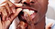 © Andrey Popov - Man Chewing Wet Moist Nicotine Tobacco Snus