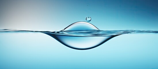 Aufkleber - A drop of water caught in mid air suspended in the frame with a blank space around it creating the perfect copy space image