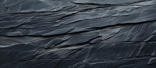 Aufkleber - High resolution top view of a naturally patterned background made of black slate stone The image provides ample copy space