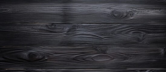 Poster - A black wooden texture with fantastic copy space brings a captivating element to design or text enhancing its visual appeal