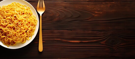 Aufkleber - A copy space image featuring a plate of instant noodles on a yellow background with a fork