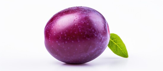 Poster - Close up shot of a kernel less smooth skinned purple plum fruit isolated on a white background Copy space available for text or images