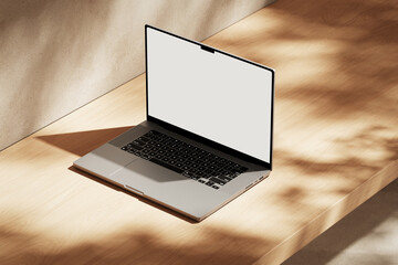 Wall Mural - apple macbook pro on the wooden desk on a plaster background