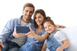 © ty - Beautiful young family with little child taking a selfie with a smartphone on a transparent background