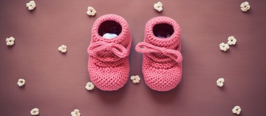 Poster - Copy space image of a background featuring fashionable baby girl wear including cute booties