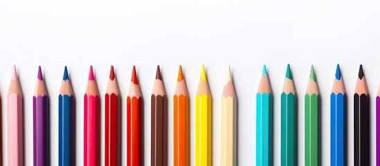 Aufkleber - A vibrant assortment of colored pencils on a blank white backdrop providing ample blank space for additional imagery