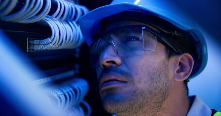Leinwandbilder - Man, engineer and cables in server room with information technology for hardware in night with helmet. Cybersecurity system, it network and person for fiber internet, goggles and safety with hardware