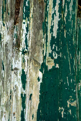 Bright green wooden textured surface with hints of rust