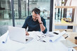 © peopleimages.com - Mature man, architect and headache for building planning design problem with laptop and blueprints in office. Senior, male engineer and stress or panic for project deadline with computer and paper