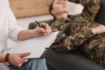 Poster - Psychotherapist working with military woman in office