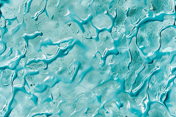 Canvas Print - A blue background with water droplets on it