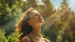 © john - Relaxed woman breathing fresh air in a green forest. 