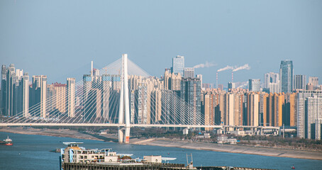 Majestic Wuhan Yangtze River Second Bridge and skyscrapers located on the banks of the Yangtze River