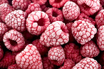 Wall Mural - Berries background - frozen raspberries covered with hoarfrost. Summer berries, view from above.