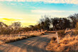 © Austockphoto - Winding dirt road in rural countryside