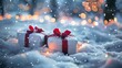 © May Chanikran - Two beautifully wrapped gift boxes with red ribbons sit in the snow with warm holiday lights in the background.