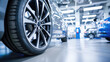 © Александр Довянский - Close-up of a modern car wheel with an alloy wheel in a car service center