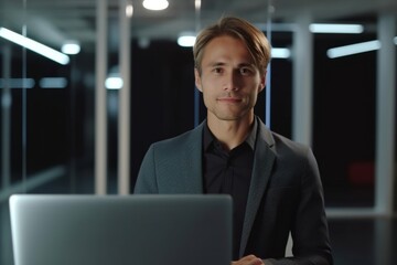 Poster - A portrait of a handsome businessman in a modern office