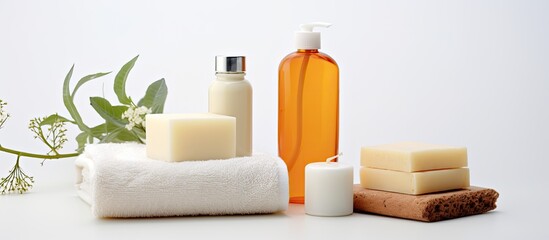 Copy space image with personal hygiene products including soap and a washcloth placed on a clean white background