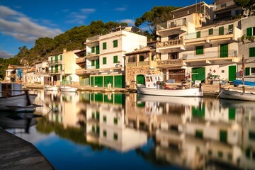 Canvas Print - long exposure view of the picturesque village and harbour at Cala Figuera on Mallorca