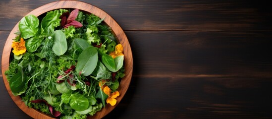 Poster - Close up wooden plate with mix of fresh leaf salad with copy space top view Healthy food Green meal
