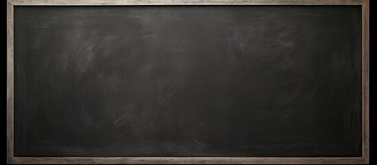 Poster - Image of a blank chalkboard with erased marks providing a clean surface for educational purposes. copy space available