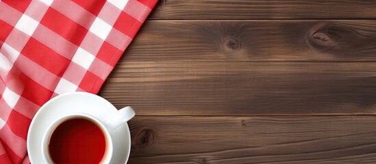 Aufkleber - White cup of coffee on wooden background and copy space with red handkerchief