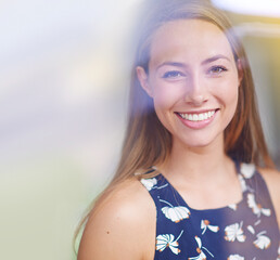 Poster - Australia woman, portrait and happy in studio for summer, skincare or hair care with blur background. Smile, glow and female person with natural beauty in sunlight with flowers, fun or dental hygiene