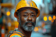 © Nadezda Ledyaeva - happy african american construction worker in front of colleagues