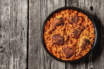 Wall Mural - baked greek chicken orzo stew in tomato sauce