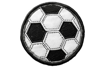 close-up image of a black and white embroidered soccer ball patch with hexagonal patterns, suitable 
