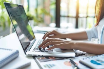 Poster - Woman working on laptop at desk, suitable for office and technology concepts