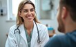 © EBgi - Female doctor smiling at patient during consultation in clinic.