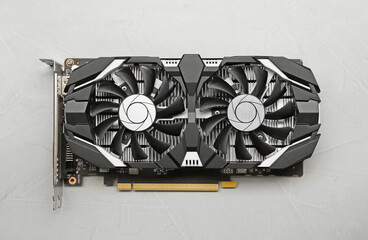 Poster - Computer graphics card on gray textured background, top view