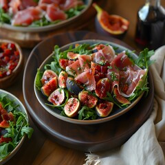 Wall Mural - Fresh fig and prosciutto salad with arugula, garnished with chives and balsamic glaze