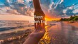 © Muhammad - A serene beach setting at sunset, featuring a hand of a human and child holding, 'Happy Father's Day' text in the center.
