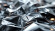 © admin_design - The image is a close-up of a crumpled piece of silver foil
