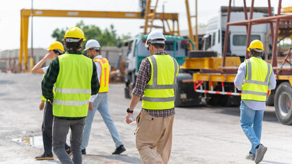 Wall Mural - Group of Engineer and foreman worker team inspect the construction site, Site manager worker and builder on construction site.