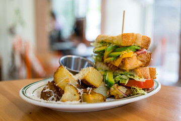 Poster - Sandwich with avocado and grill potato at coffee shop