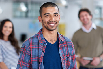 Poster - Man, employee and happy in office on portrait for career or job growth and opportunity graphic designer. Employees, people and smile or confident with teamwork and collaboration in digital agency