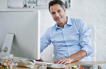 Poster - Portrait, entrepreneur and man with smile in office, computer and internet for email, proposal and deal. Designer, CEO and person in business, monitor and digital for website, online and creative